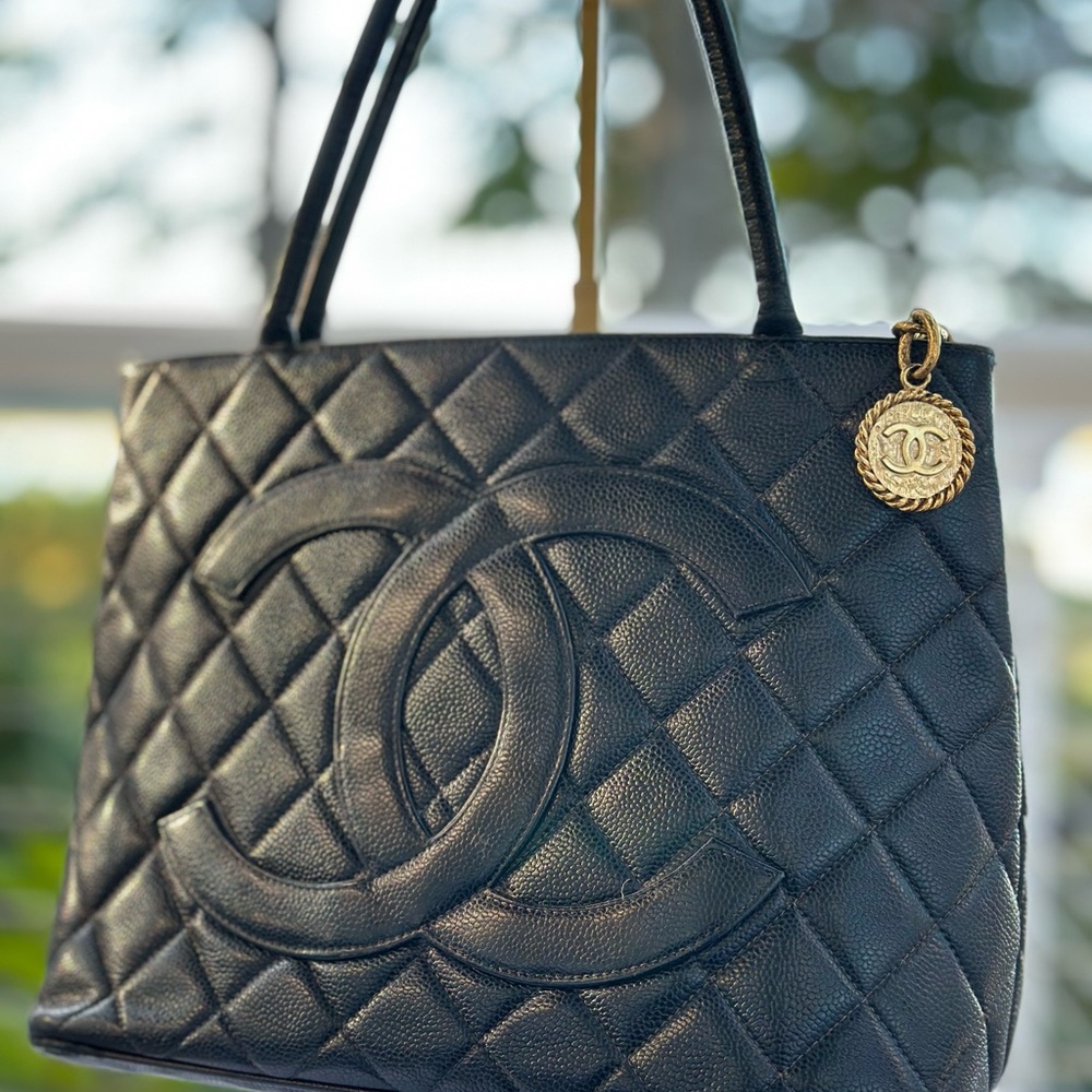 CHANEL Black caviar Quilted Tote with Gold medallion Charm